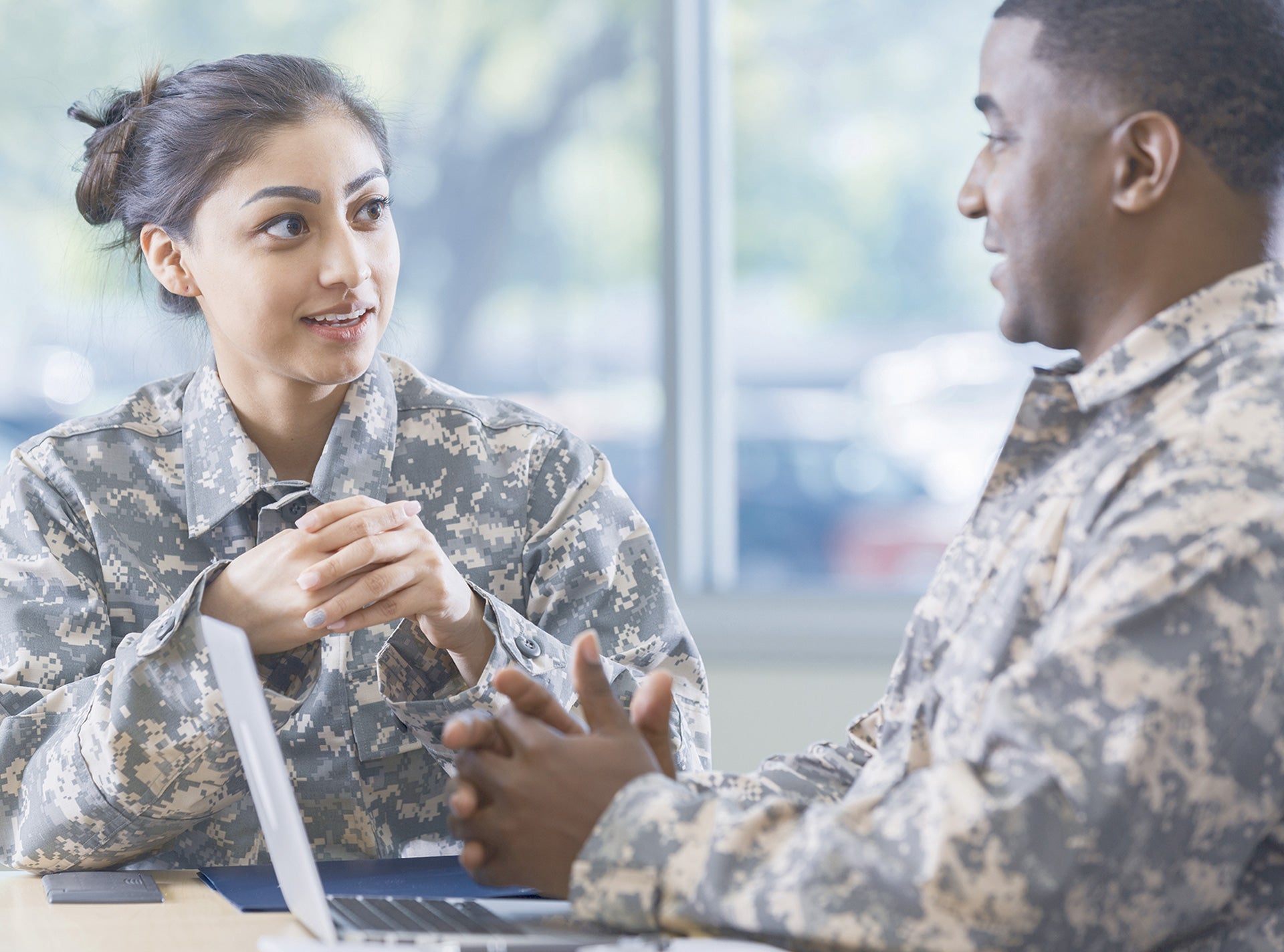 two army collegues discussing with each other