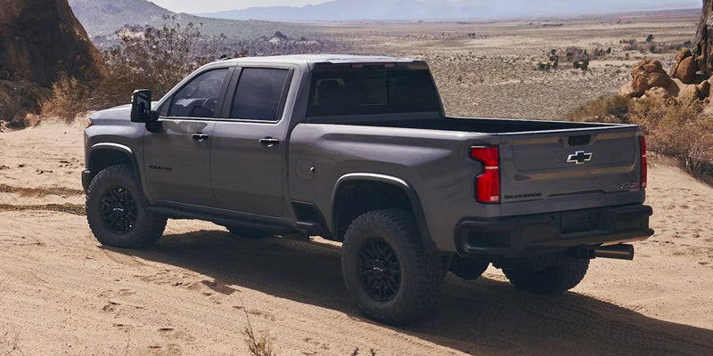 black chevy doing offroading in desert